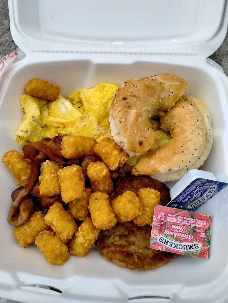 Scrambled Eggs Tater Tots Bacon and Bagel
